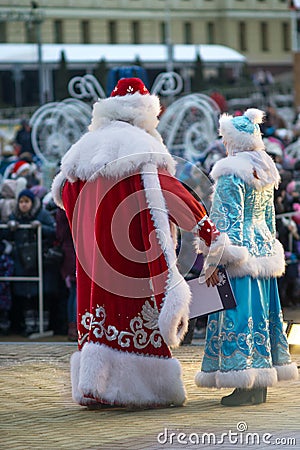 Father Frost and the Snow Maiden congratulate people merry Christmas Editorial Stock Photo